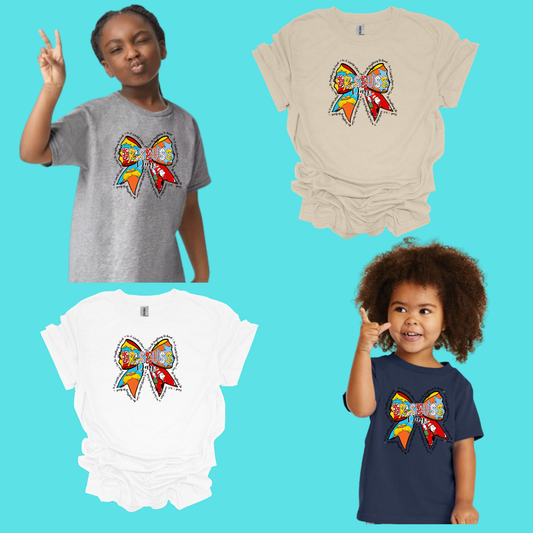 IN A WORLD WHERE YOU CAN BE ANYTHING BE KIND BOW youth T-SHIRT