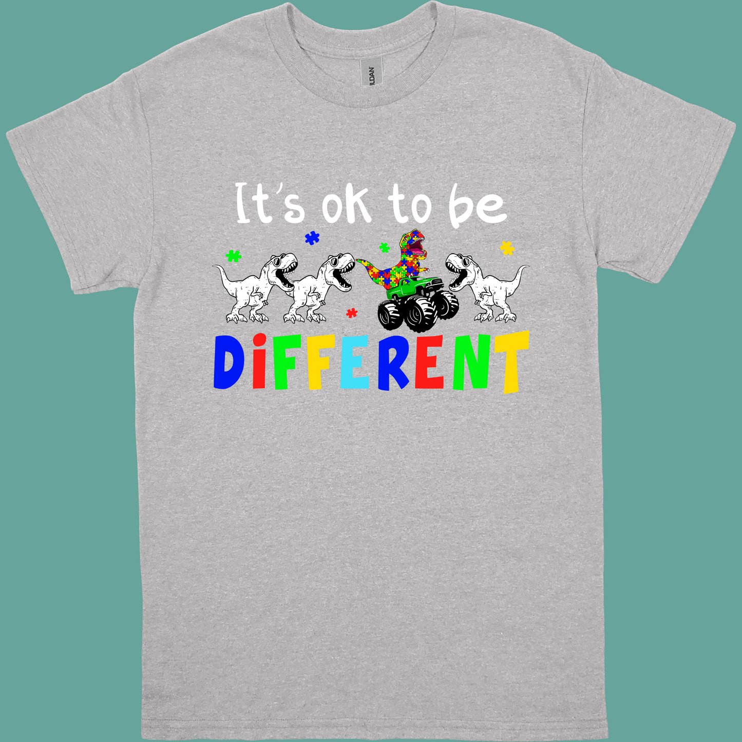 IT'S OK TO BE DIFFERENT (DINO) ADULT/YOUTH TSHIRT